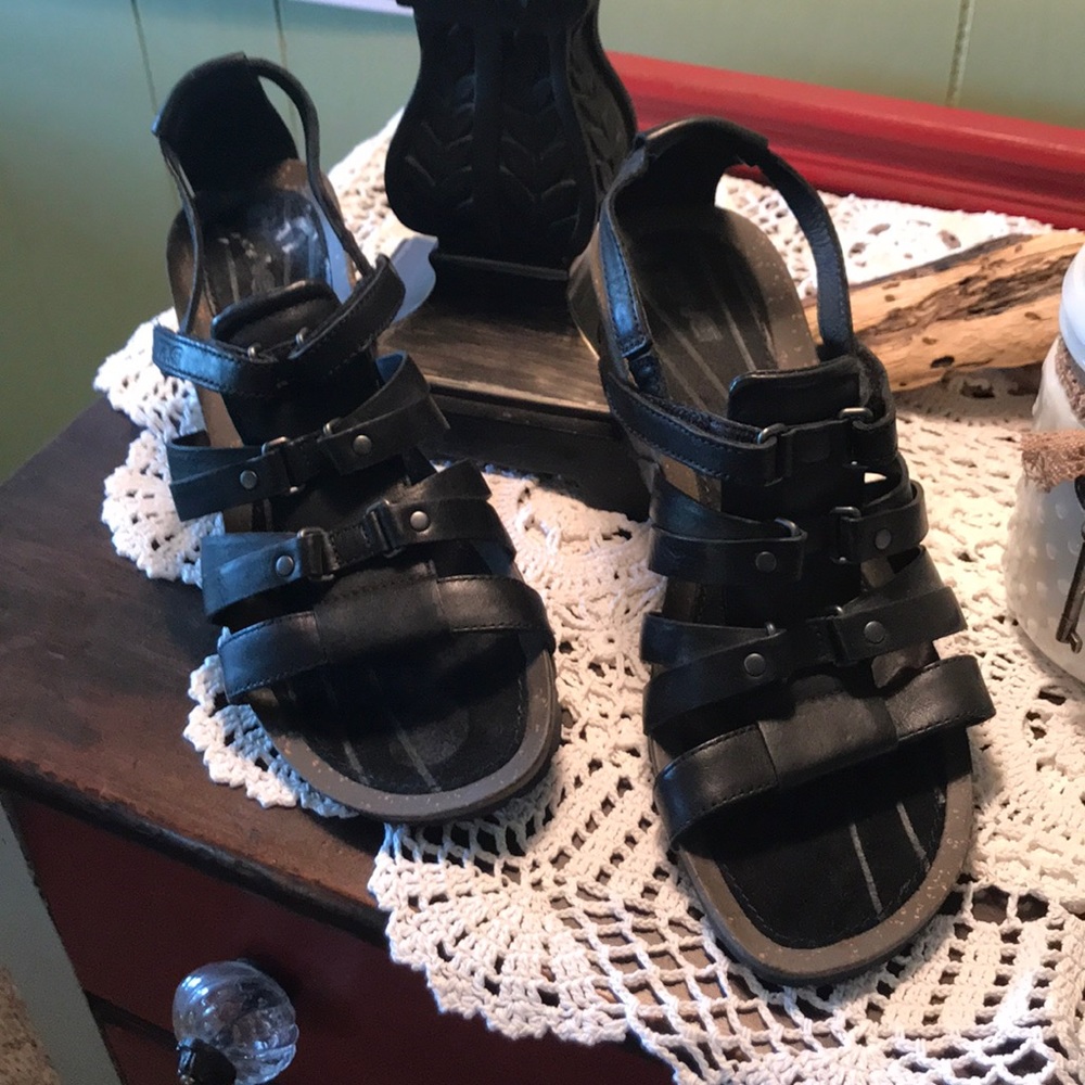 Teva wedge Velcro sandals.